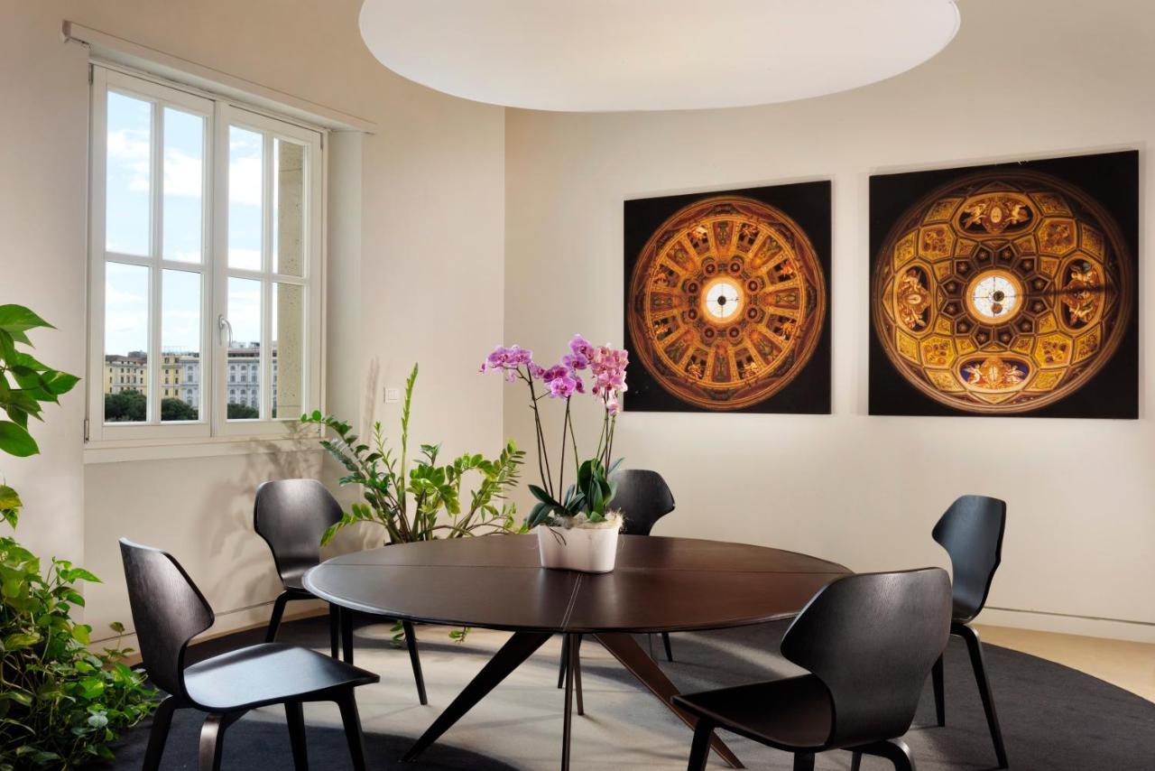 Palazzo Montemartini Rome, A Radisson Collection Hotel Bagian luar foto A dining room