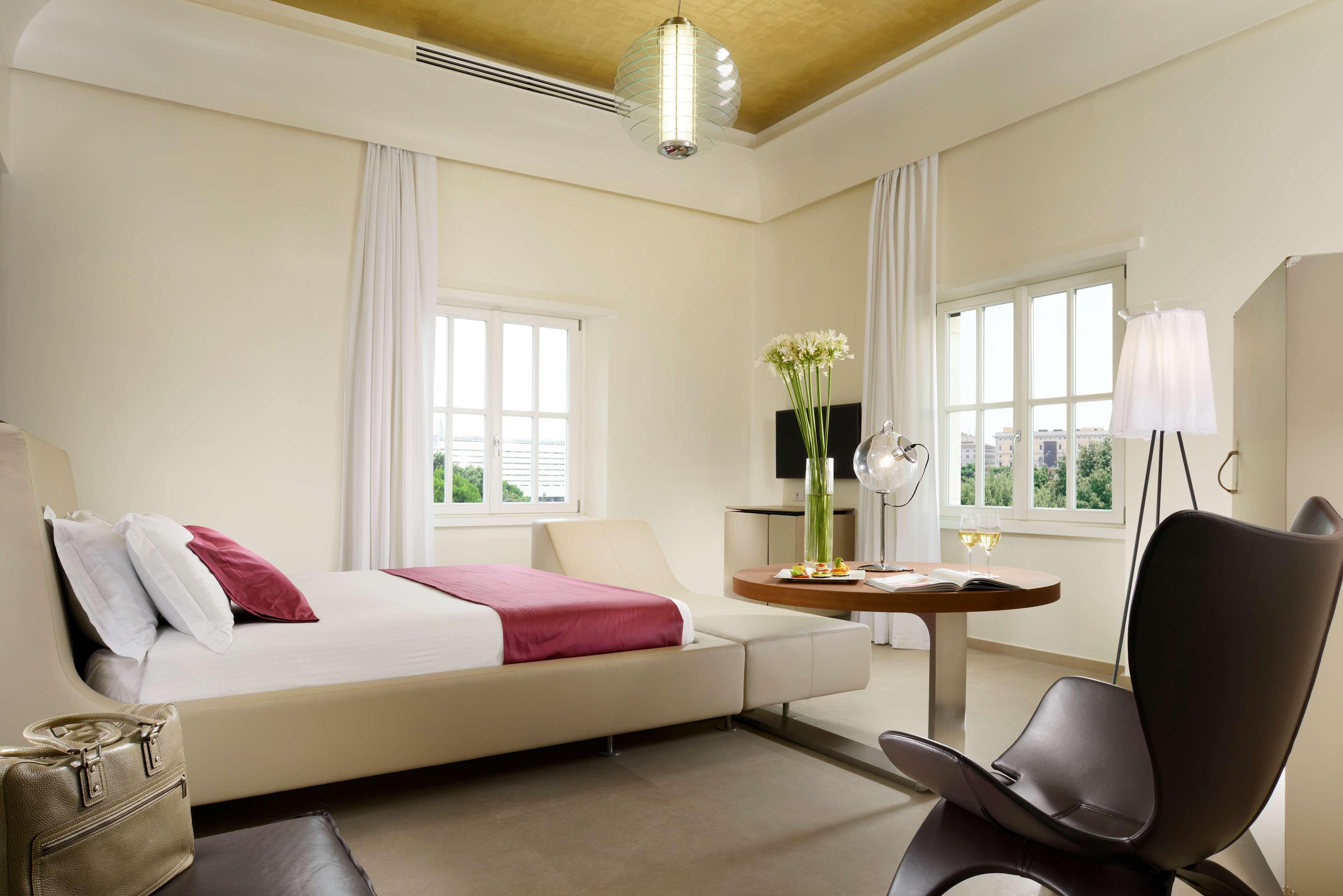 Palazzo Montemartini Rome, A Radisson Collection Hotel Bagian luar foto A room at the Mandarin Oriental, Singapore