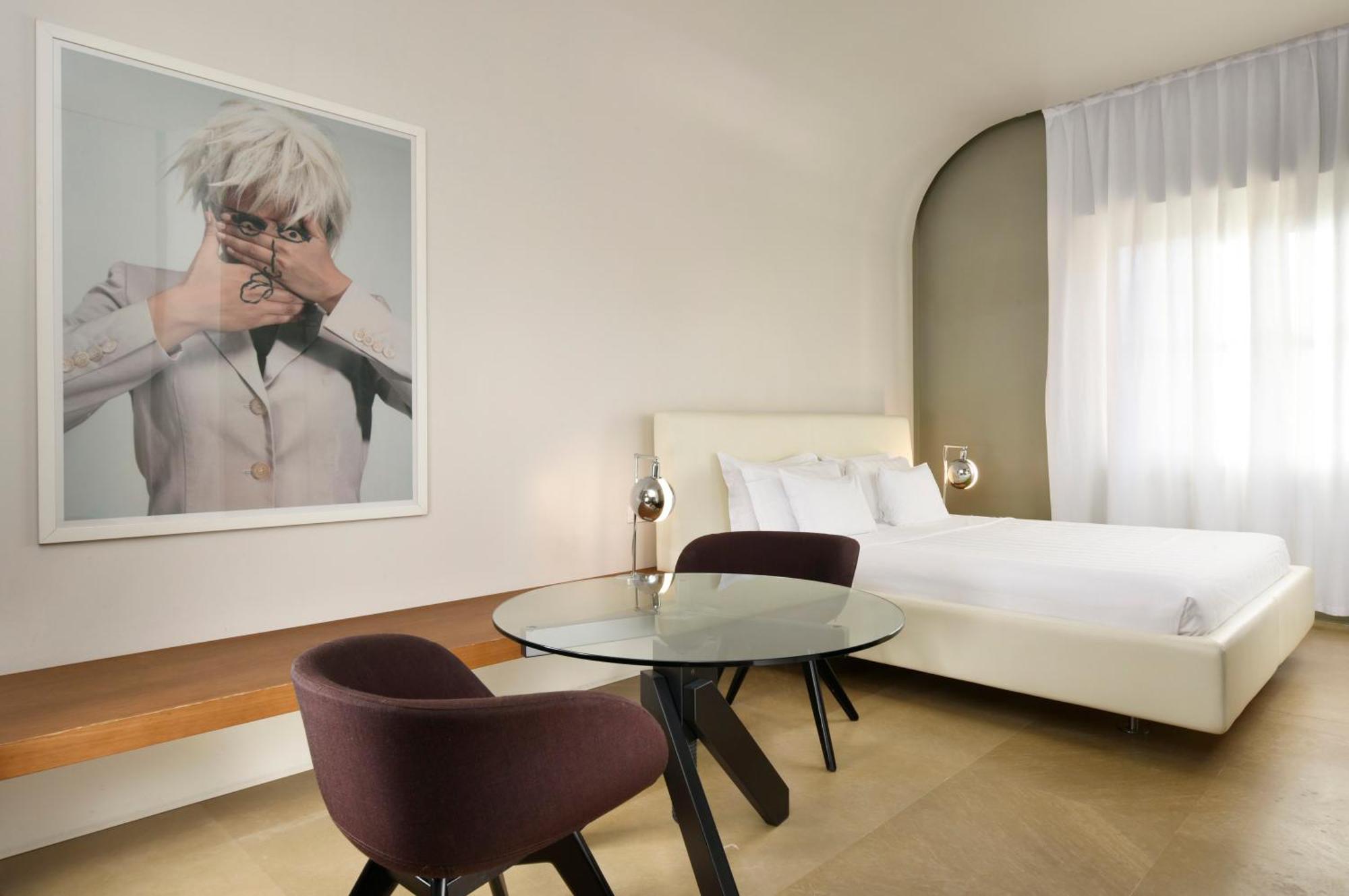 Palazzo Montemartini Rome, A Radisson Collection Hotel Bagian luar foto A room at the Hotel