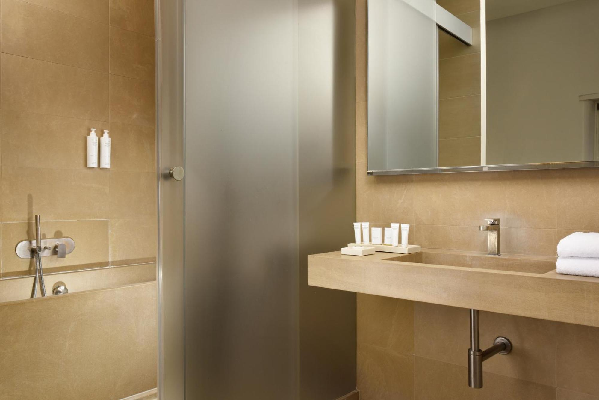 Palazzo Montemartini Rome, A Radisson Collection Hotel Ruang foto Bathroom