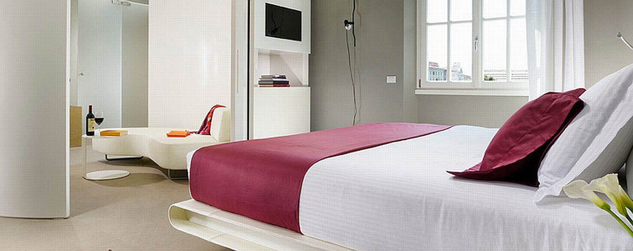 Palazzo Montemartini Rome, A Radisson Collection Hotel Bagian luar foto A bed runner