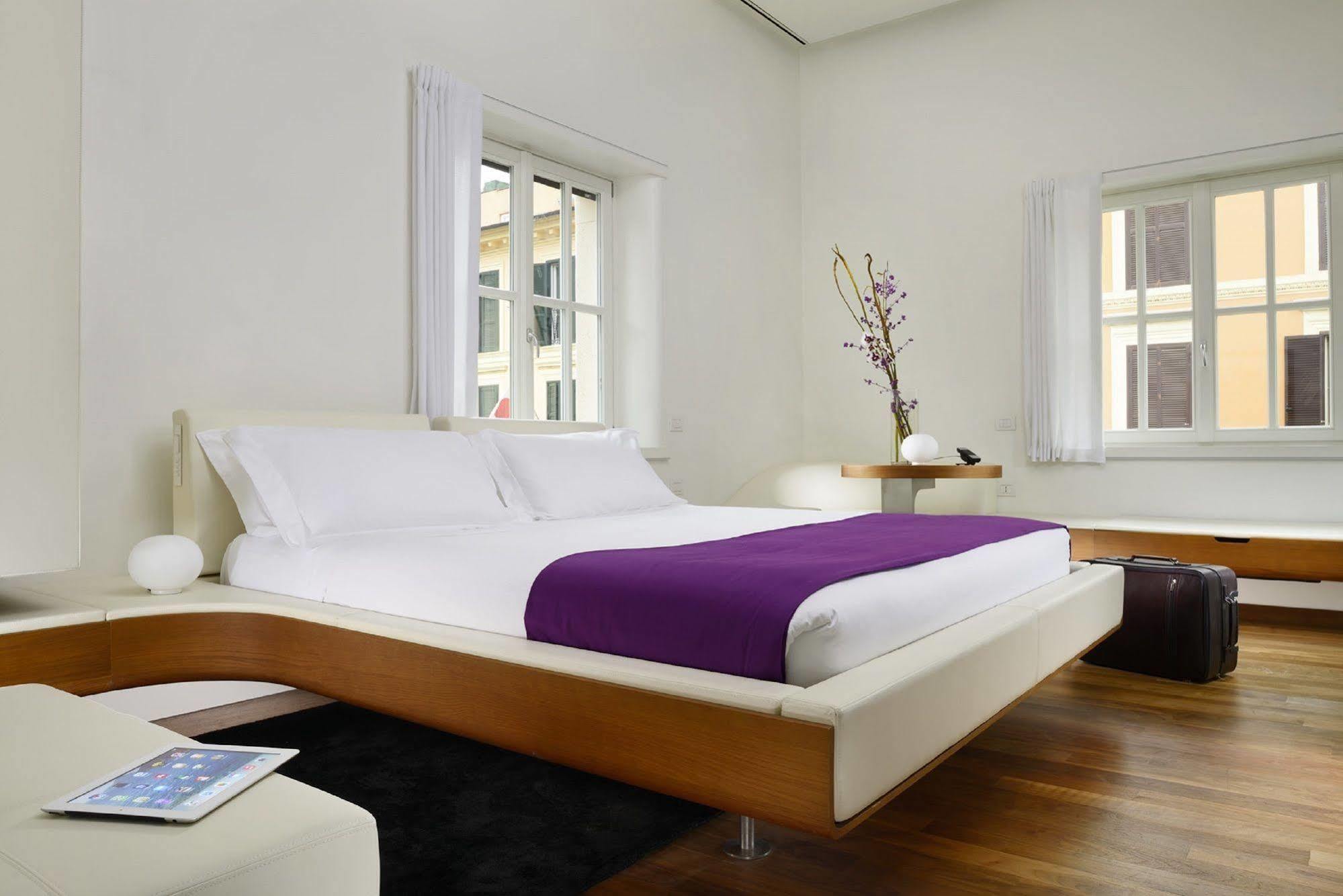 Palazzo Montemartini Rome, A Radisson Collection Hotel Bagian luar foto A bedroom at the Standard East Village